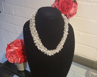 White crochet beaded necklace with metallic silver thread