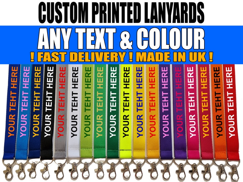 Puede incluir: Una colecci&oacute;n de quince cordones de tela en varios colores, incluyendo azul, negro, gris, blanco, verde, amarillo, naranja, morado, rosa y rojo. Cada cord&oacute;n presenta el texto repetido YOUR TEXT HERE y un mosquet&oacute;n de metal plateado.