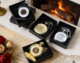 May include: Four pocket watches in black gift boxes. One black watch with a white face, one gold watch with a white face, one gold watch engraved with "William Groomsman 03.03.2026", and one silver watch engraved with "Branden" and a mountain graphic.