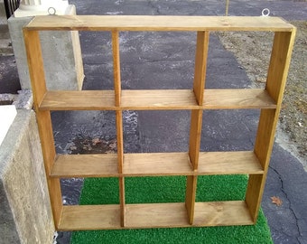 Square shaped shelving unit for small items