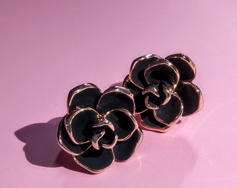 Black floral clip on earrings