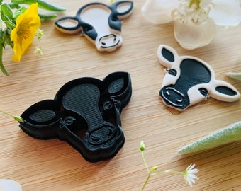 Coupe-pâte à découper en forme de tête de veau : conception de boucle d'oreille ciselée en relief