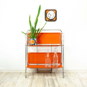 Iconic orange 1970s FOLDABLE BAR CART 'Dinett' by Bremshey