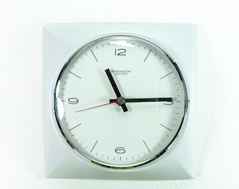 Off-white 1960s midcentury CERAMIC WALL CLOCK by Remington West Germany
