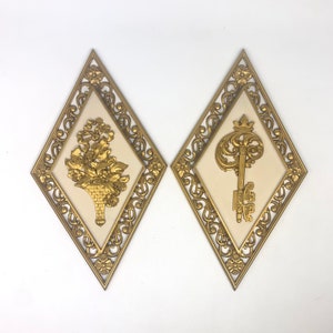 Ornate flowers and key Syroco plaques 60s vintage Hollywood Regency art