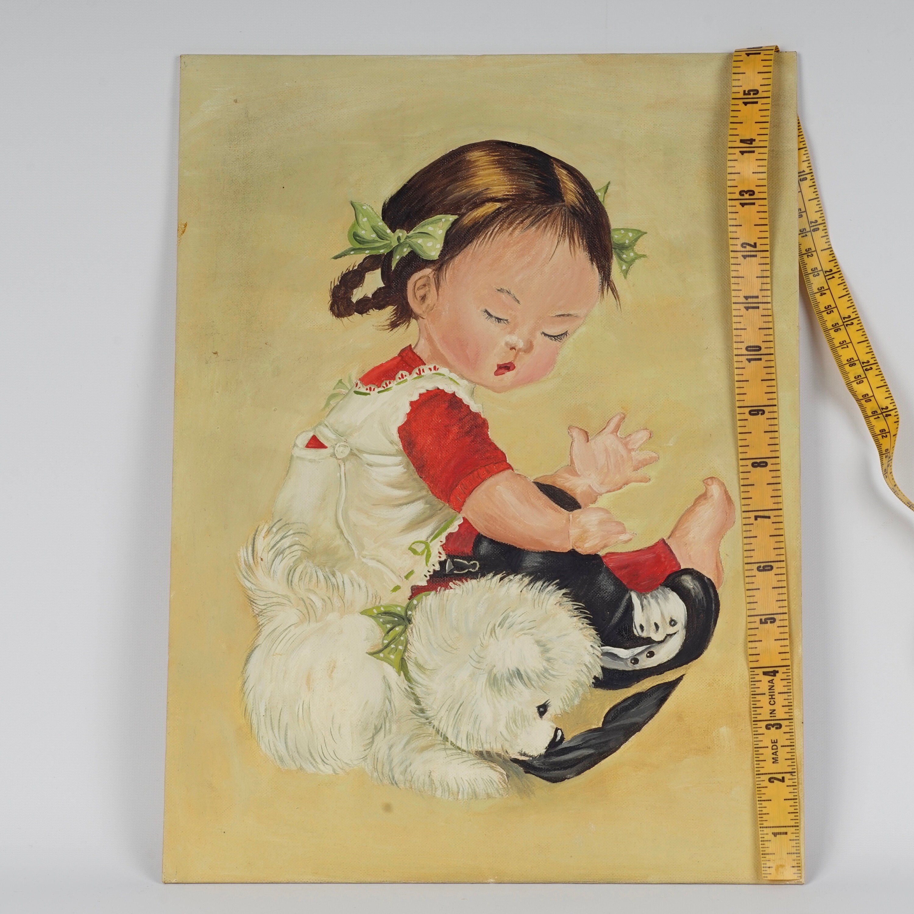 White Puppy Dog and Little Girl With