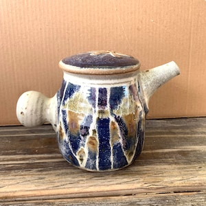 signed art studio pottery teapot w knob handle daisy lid signed Hutchfield