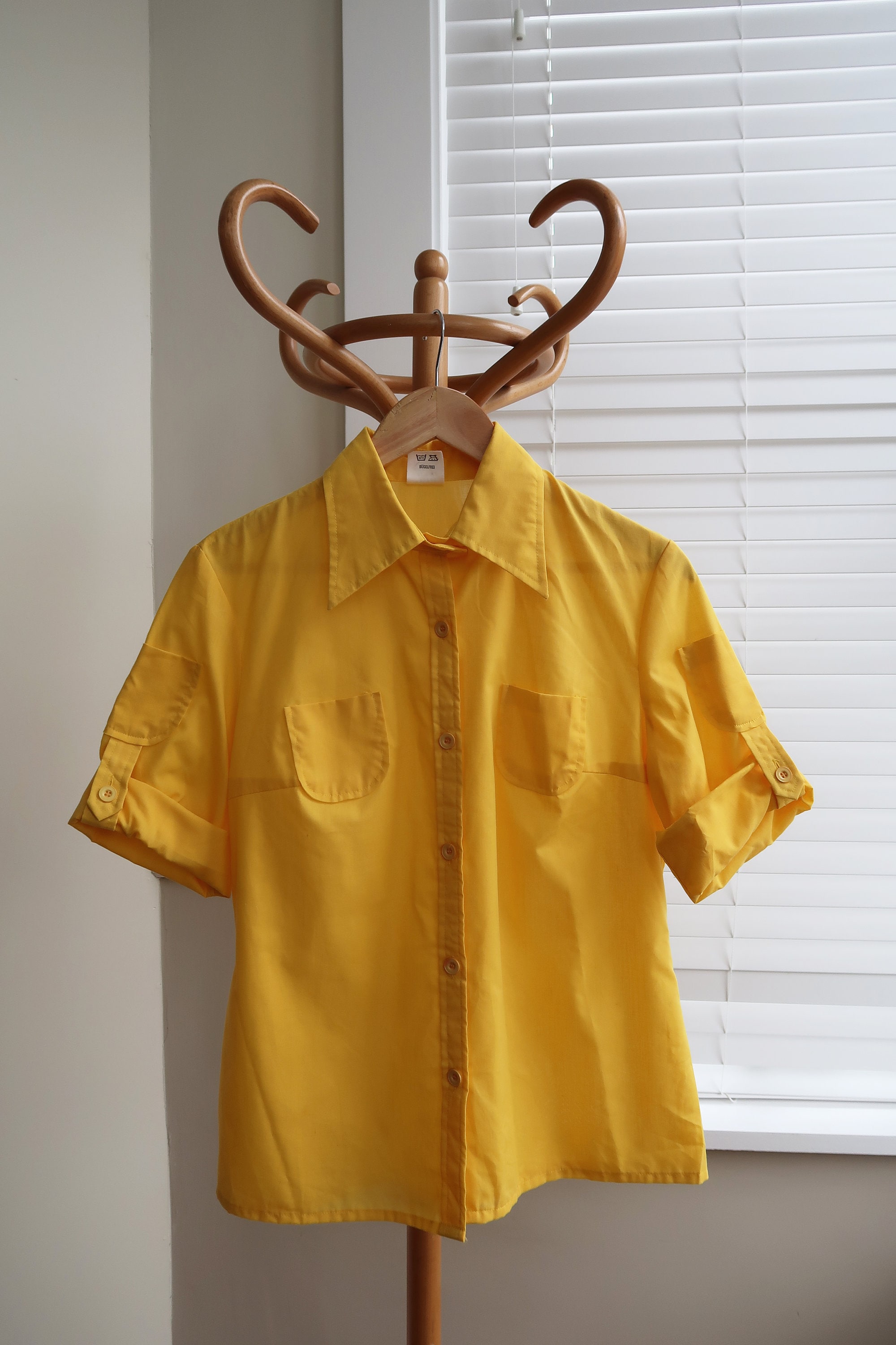 bright yellow button down shirt