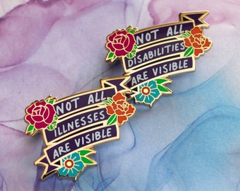 May include: Two gold enamel pins with floral accents and the text "Not all disabilities are visible" and "Not all illnesses are visible".