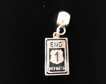 End of the road charm  - Key West charm bracelet. Silver  color.