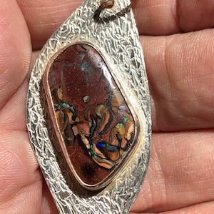 Koroit Boulder Opal set in a Sterling silver pendant