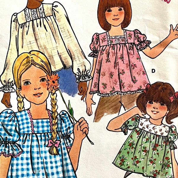 UNCUT 1975 Butterick 4143 girl's size 12 yoked top with back buttons, long gathered or short gathered sleeves  with ruffles; breast 30".