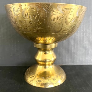 Large solid brass compote bowl on pedestal, bowl and foot with leaf etchings, made in India, very good vintage condition; 5.75&quot; t x 6&quot; w.
