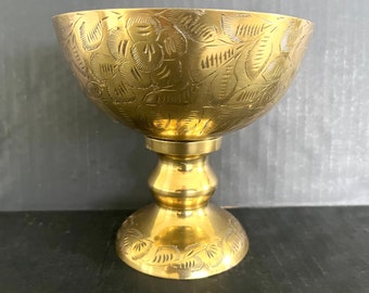 Large solid brass compote bowl on pedestal, bowl and foot with leaf etchings, made in India, very good vintage condition; 5.75" t x 6" w.