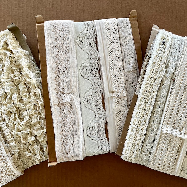 Reels of vintage sewing laces, most flat, some gathered, some scalloped, crocheted look, all in excellent condition; cream, buff, off-white.