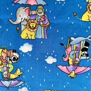 44&quot; wide x 3 yards 4&quot; long Noah&#39;s Ark novelty cotton fabric by Fabric Traditions, bright blue with Noah, animals under umbrella---darling!