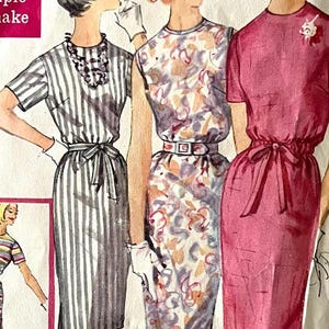 May include: Vintage sewing pattern featuring three dresses. The dresses include a striped dress with a bow, a floral print dress with a belt, and a solid pink dress with a bow. The text "Simple to make" is visible.