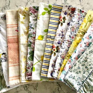 Vintage standard-sized or queen-sized pillowcases, selling separately, most cotton/poly blend, all in great condition.