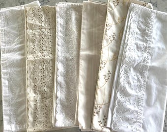 Standard sized softly-hued pillowcases, all a cotton/poly blend except for case F, which is all polyester. Sold separately.