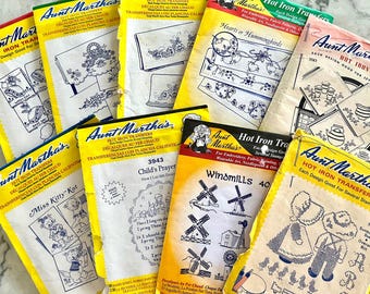UNCUT, many unopened, vintage Aunt Martha's hot iron transfers featuring motifs for linens, quilts, pillowcases, etc.