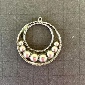 Vintage Mexican sterling necklace pendant, stamped Mexico 925 sterling on back, round with graduated balls, rope edges; 1 1/8&quot; in diameter.