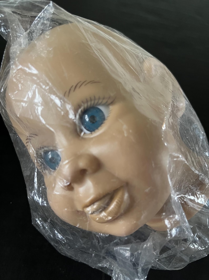 Vintage doll heads in all sizes and forms, some porcelain, some plastic, some adults, some pixies, some children, doll bodies, doll wig. image 3