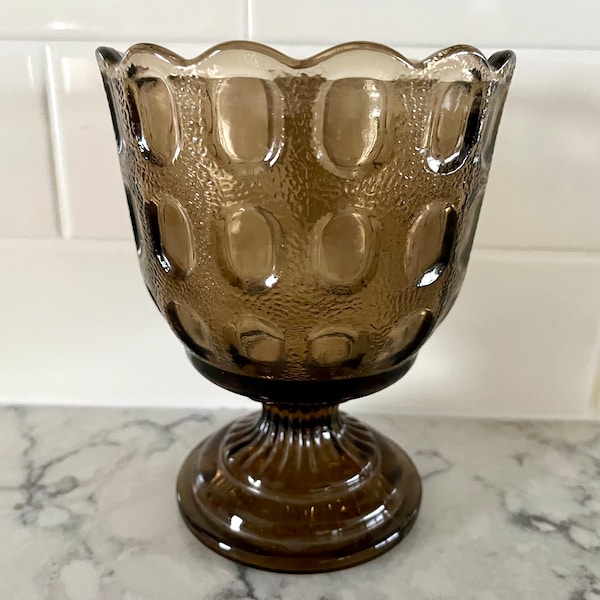 Vintage E.O. Brody thumbprint smoky brown compote or candy dish on footed base; 5 7/8" tall x 4.5" in diameter at top rim, great condition.