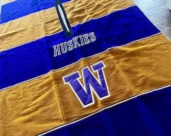 Washington Huskies game day poncho with fringe, like-new condition, one size fits all.