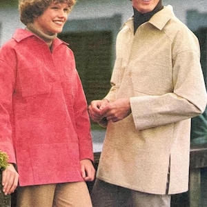 May include: Two people wearing long-sleeved shirts. One shirt is a coral color, and the other is a light tan. Both shirts have a collared neckline and two front pockets. The coral shirt has a buttoned placket, and the tan shirt has a side slit.