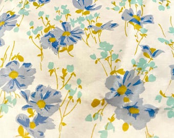 Full-sized flat floral sheet by Morgan Jones, 50/50 cotton poly blend, blues and olive florals on white, excellent condition.