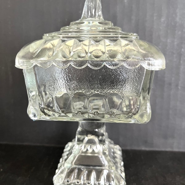 Jeanette Glass Co. clear glass wedding box on pedestal with lid in excellent condition; 6.75" from base to top of finial x 3 7/8" wide.