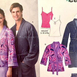 May include: A sewing pattern featuring a man and woman wearing robes. The woman's robe is a vibrant purple with a floral design, while the man's is a solid gray. Additional garment patterns include a denim robe and camisoles.
