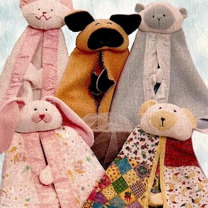 May include: Five plush baby toys in the shape of a cat, dog, bear, bunny, and another bear. The toys are all made of soft fabric and have different patterns and colours. The toys are all designed to be used as security blankets for babies.