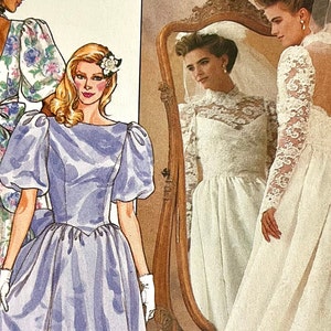 May include: A wedding dress with a lace bodice and long sleeves. The dress has a low back and a flowing skirt. The dress is white and the lace is ivory.