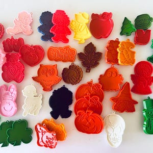 Vintage Hallmark & Current plastic cookie cutters, raised relief designs; Christmas, Halloween, Valentines, Easter,  terrific condition.