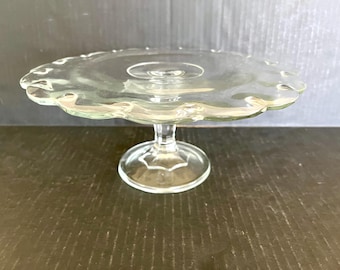 Vintage Indiana Glass pedestal cake plate, teardrop pattern, clear glass, scalloped edge, excellent condition; 4.75" tall x 10.75" diameter.