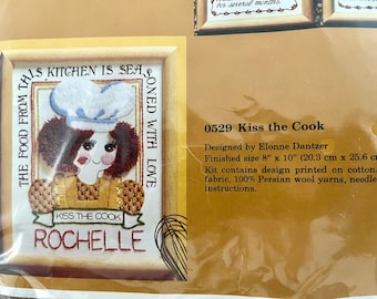 UNOPENED 1981 The Creative Circle #529, Kiss the Cook crewel embroidery kit designed by Evonne Dantzer, finished size 8" x 10".