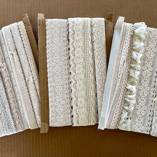 Reels of vintage laces in creams, tans, taupes, blush, some with scallops edges, some gathered, most flat, all in excellent condition.