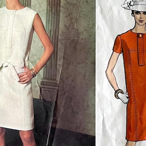 May include: Vintage sewing pattern featuring two dresses. One is a sleeveless white dress with a tie belt and pocket details. The other is an orange dress with short sleeves and a button detail. Both dresses have a retro style.