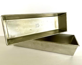 Set of two extra-long aluminum pullman loaf bread pans with folded ends,made by Ekco, T-640; each 12.75" long x 4.5" wide, great condition.