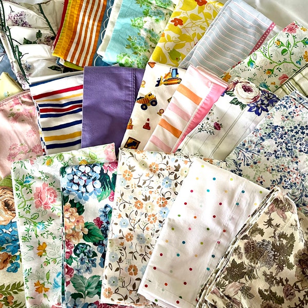 Vintage standard- and queen-sized pillowcases, selling separately, all cotton/poly blend, all in great condition; stripes, florals, more!