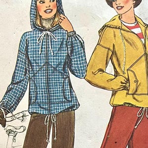May include: Illustration of two people wearing hooded jackets and drawstring trousers. One jacket is blue with a white grid pattern, the other is yellow. The trousers are brown and red. The jackets have pockets and drawstrings.