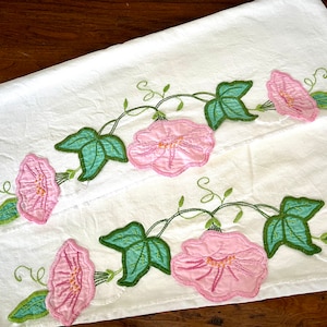 Set of 2 all-cotton pillowcases, appliquéd and embroidered with pink florals and green vines and leaves, exceptional work; standard sized.