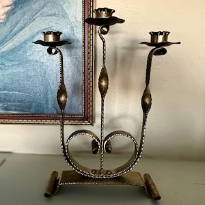 Vintage large solid cast metal candelabra, shiny antiqued gold finish, 3 taper cups, twisted stems, wide base, lovely! 15&quot; x 11.25&quot; x 3.25&quot;.