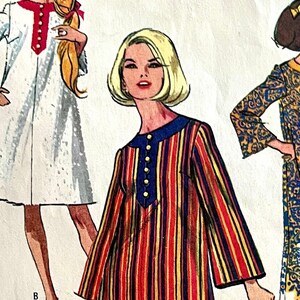 May include: Three vintage sewing patterns for dresses. The first dress is white with a red collar and buttons. The second dress is striped with red, yellow, blue and black stripes. The third dress is blue and yellow with a paisley pattern.