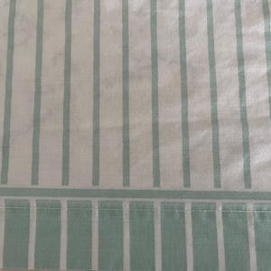Vintage full-sized flat or fitted bed sheet by Fieldcrest Cannon, light seafoam green and white stripes, great condition, 50/50 poly cotton.