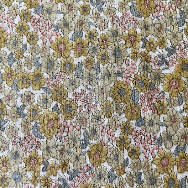 45" wide x 2 yards long (minus a corner, see photo) all-cotton floral print fabric in golds, tans, pinks, dusty blue on white, great shape.