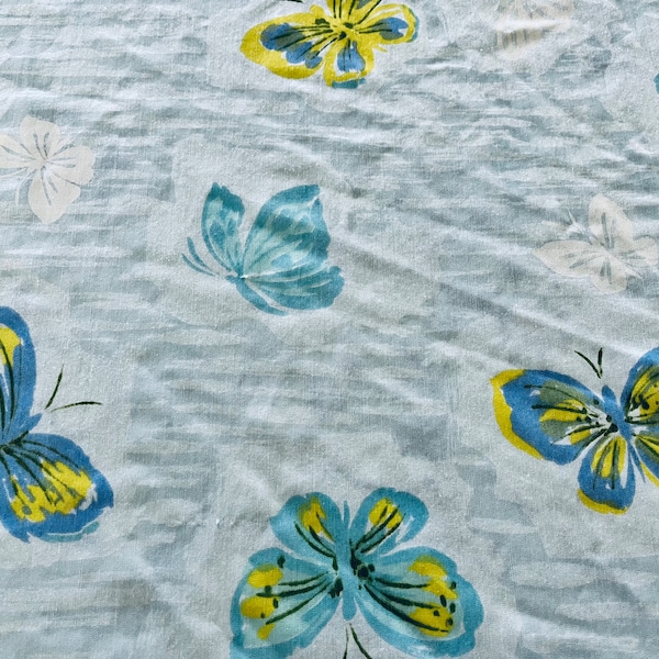 Vintage full-sized fitted or flat bed sheet by Pequot, 65/35 poly cotton blend, blue & chartreuse butterflies on light blue, exc. condition.
