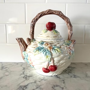 Majolica-style basket-weave ceramic tea pot with Cheries, florals, branch-like handle, spout.