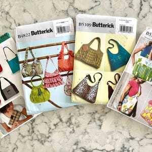 UNCUT handbags, purses, wallets, shoulder bags and totes patterns from 2004-2012, selling separately.